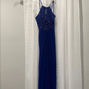 Super cute long blue dress.